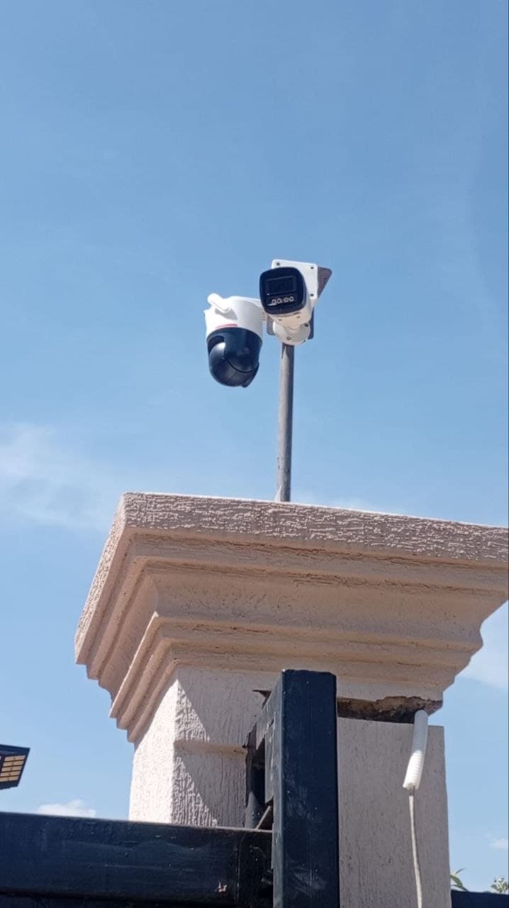 Camera + electric fence — layered rooftop security