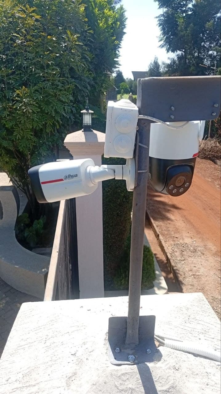 Tiandy bullet pair — corner mount, full perimeter view